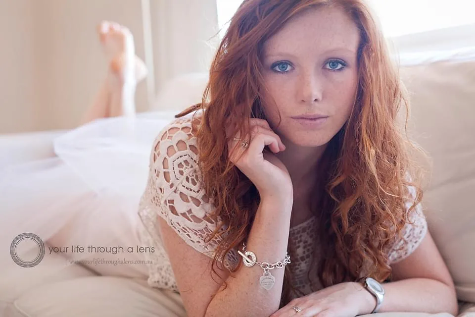 Professional photographer shooting outdoors at golden hour in the Kansas City area